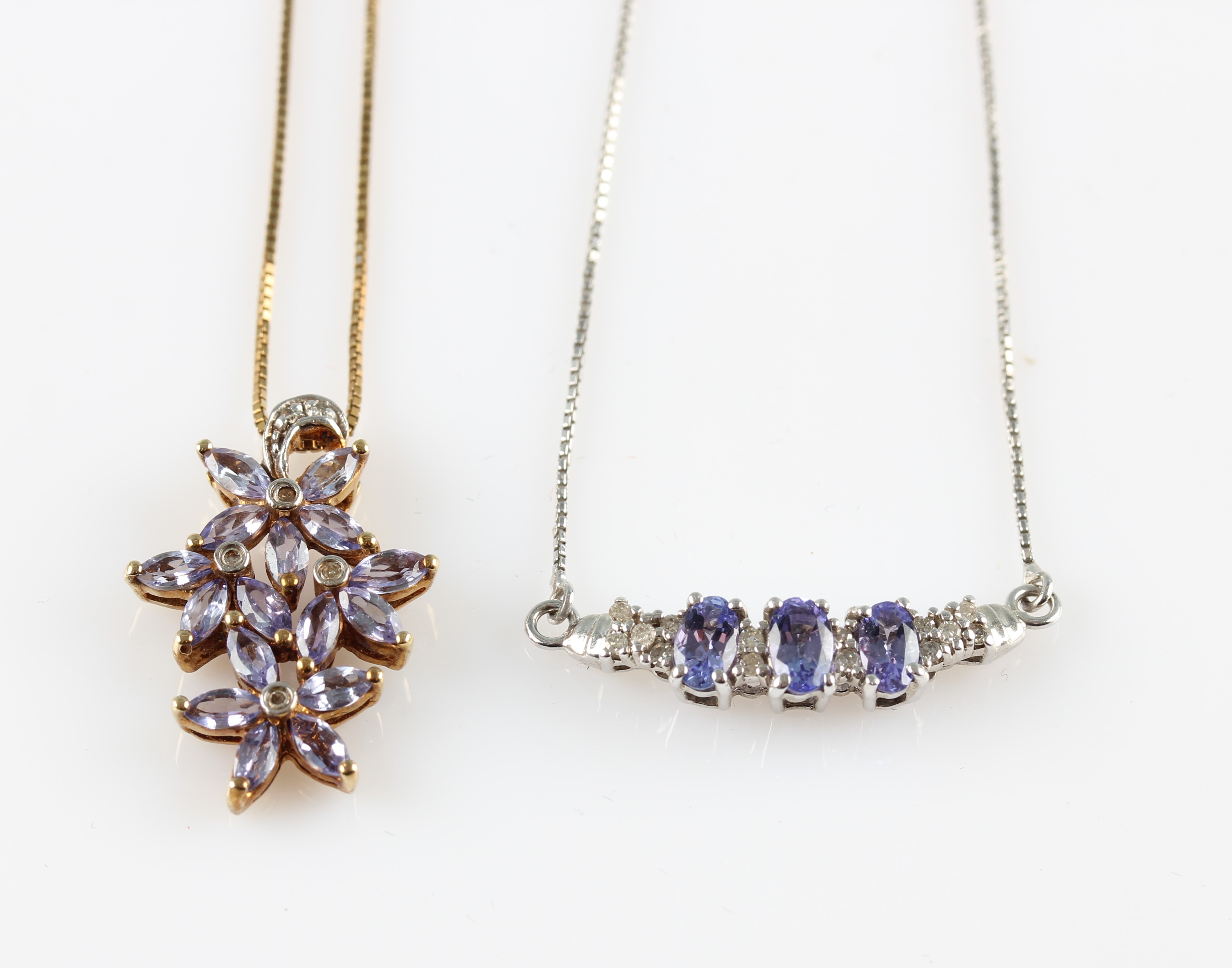 Two pendants, both set with tanzanite and stamped 925 (2).