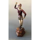 An Art Deco style modern sculpture of dancing female, on red and orange marble base, height 38cm,