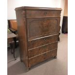 A walnut secretaire Biedermeier desk fitted with four drawers and interior. Height- 144cm Width-105