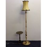 A Japonised cream painted standard lamp with a small wine table.