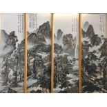 Four framed and glazed silk panels, depicting mountain scenes.