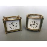 Two brass carriage clocks, one oval form, one rectangular.