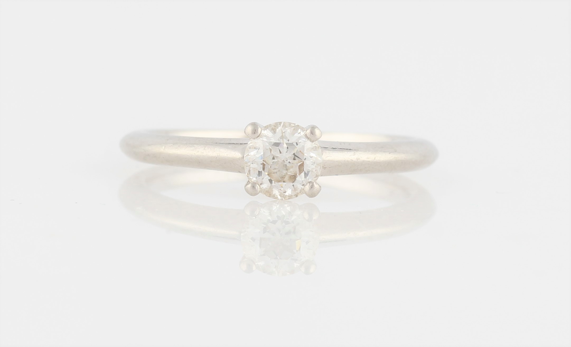 A hallmarked platinum diamond solitaire ring, set with a master cut diamond measuring approx. 0.