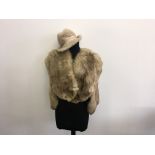 A Light brown fur shawl with trilby style hat by The Weald Furriers