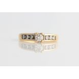 A diamond ring, set with a principal round brilliant cut diamond, measuring approx. 0.40ct,