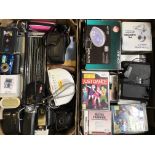 Two boxes of various camera equipment, including flip video, Fuji film, PC camera etc, with radio,