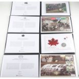 A collection of coins, to include a 2006 Trafalgar Day silver coin cover, a 2006 Lest We Forget