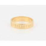 A hallmarked 18ct yellow gold engraved wedding band, ring size P.