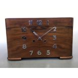 An Art Deco walnut striking mantel clock with chrome hands and numbers, 21.5cm x 35.5cm x 12.5cm.