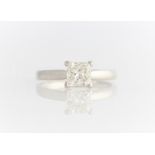 A hallmarked platinum diamond solitaire ring, set with a princess cut diamond measuring approx. 1.