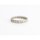 A diamond full eternity ring, set with approx. 22 old cut diamonds, each measuring approx. 0.04ct,