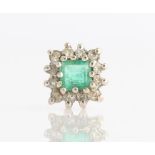 A single hallmarked 9ct yellow gold emerald and diamond cluster earring (A/F one diamond loose in