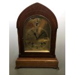 A Winterhalder & Hofmeier mahogany cased ting tang movement mantel clock with brass faced dial and