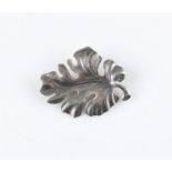 A Danish silver brooch, in the form of a leaf, hallmarked London import 1966, stamped SCF, length