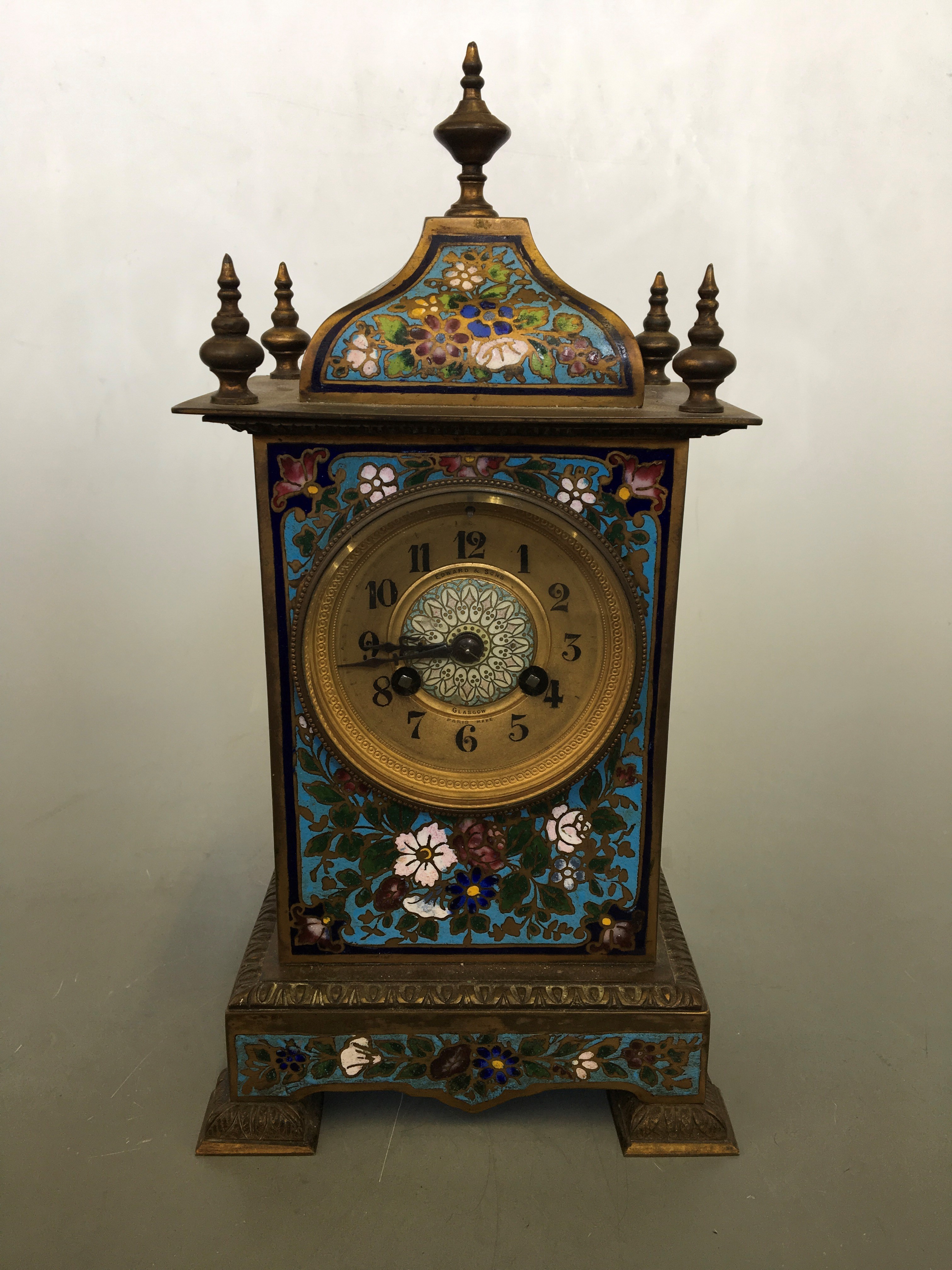 An Edward and Sons Glasgow Paris make cloisonné enamelled on brass mantel clock with five finials to