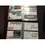 Ten albums of Royal Mail First Day Covers and Coin First Day Covers including commemorative stamps