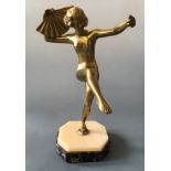 A gilt bronze Art Deco figurine of nude fan dancer, on marble base, height 32cm, width 15cm.