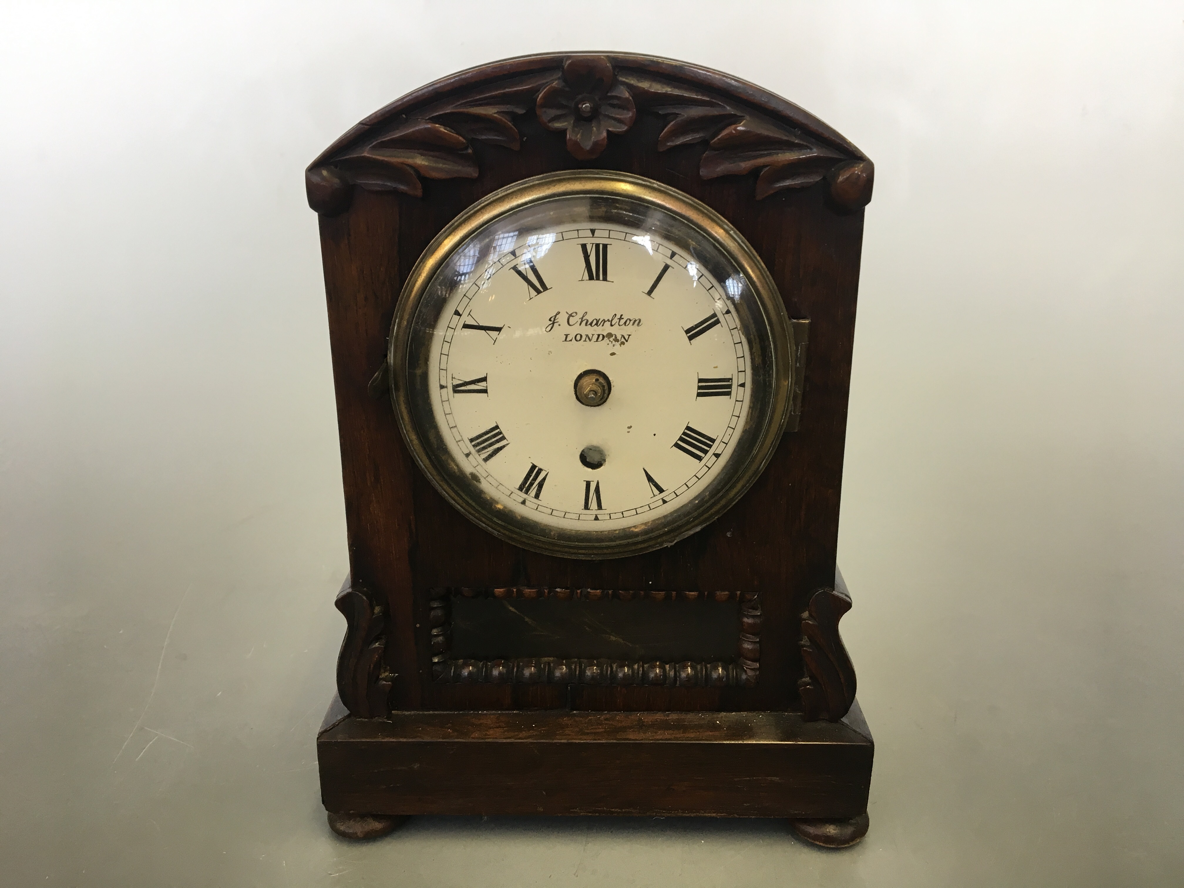 A J Charlton London small bracket clock in rosewood case with a subtle fused movement, with leaf and