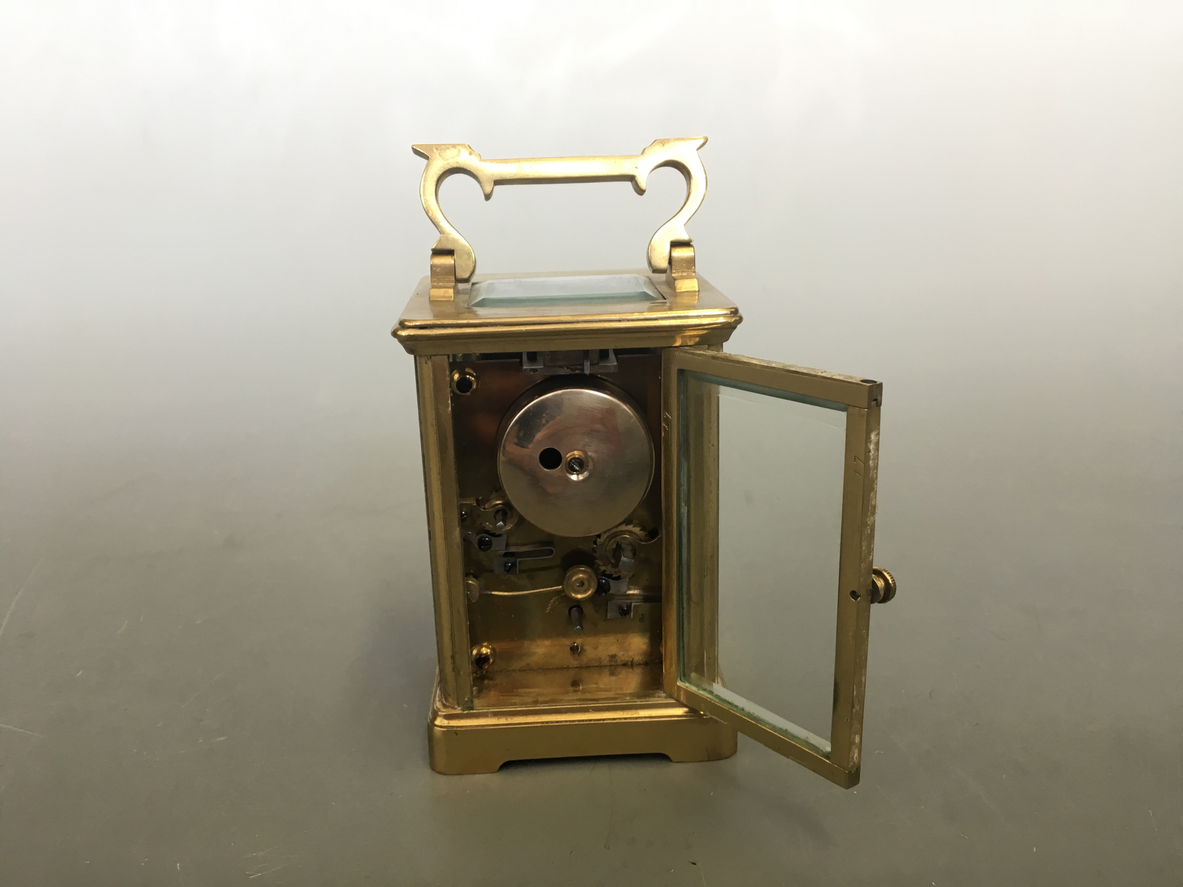 A brass five glass panelled enamelled face carriage clock. - Image 2 of 2