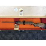 A Wembley Vulcan 22 air rifle in wooden carry case.