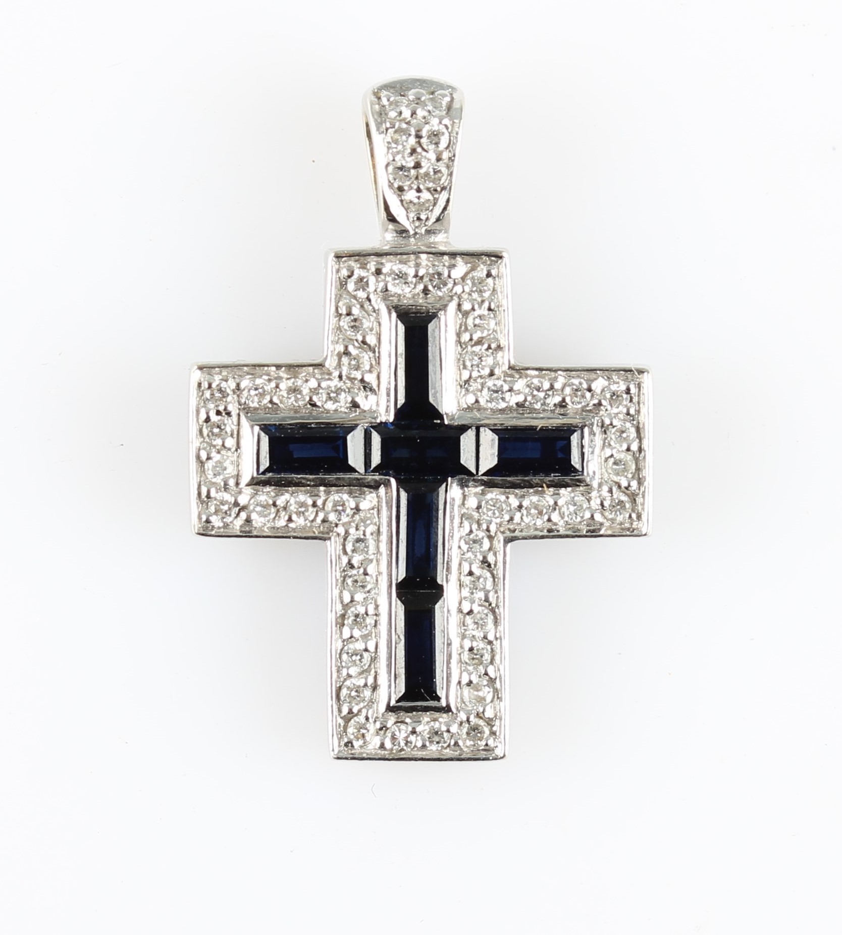 A hallmarked 18ct white gold sapphire and diamond cross pendant, set with six baguette cut sapphires