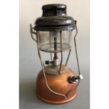 A Tilley Pyrex 171 heat resisting oil lamp.