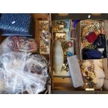 Two boxes of various costume jewellery.