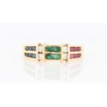 An emerald, sapphire, ruby and diamond half eternity ring, stamped 18k, ring size M.