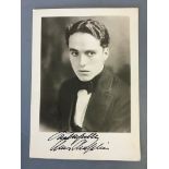 A signed photograph, ‘Faithfully, Charlie Chaplin’.