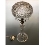 A cut glass table lamp, with bulb, height 38cm.