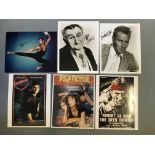 A selection of photographs and photocopies of posters signed by actors, including Uma Therman,