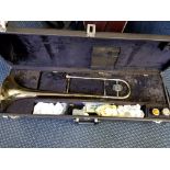 A Boosey and Hawkes trombone in carry case.