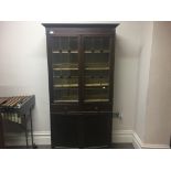 Mahogany two door glazed bookcase with two drawers and two doors to base.