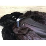 A quantity of fur coats.