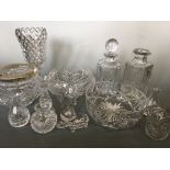 A collection of various cut glass including decanters, rose bowl, vase, small vases and dishes, jug