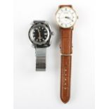 A gents Sekonda wrist watch, on a brown leather strap, together with a gents Timex wrist watch