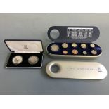 The Royal Mint millennium 2000 time capsule set, with 1999 Britannia two pound and millennium five