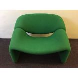 A Pierre Paulin green groovy chair.