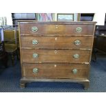 A 19th Century oak four drawer chest on bracket feet, with a set of eight brass handles inscribed “