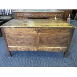 An early 19th Century stained pine blanket box sitting on four square legs, top 113.5cm by 57cm.