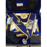 Warwickshire regiment Masonic regalia in black travel case, with various medals, gloves and apron.