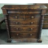 A late 19th Century mahogany six drawer chest with bobbing turned columns.