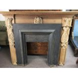 A pine fire surround with metal insert