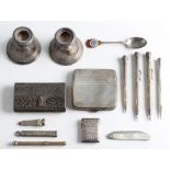 A collection of items, to include a hallmarked silver cigarette case, a pair of weighted