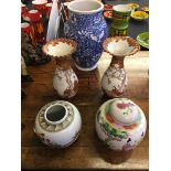 Two oriental ginger jars together with an oriental blue and white vase and a pair of satsuma vases