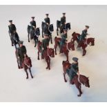 Nine Britains Toy Soldiers of cavalry.