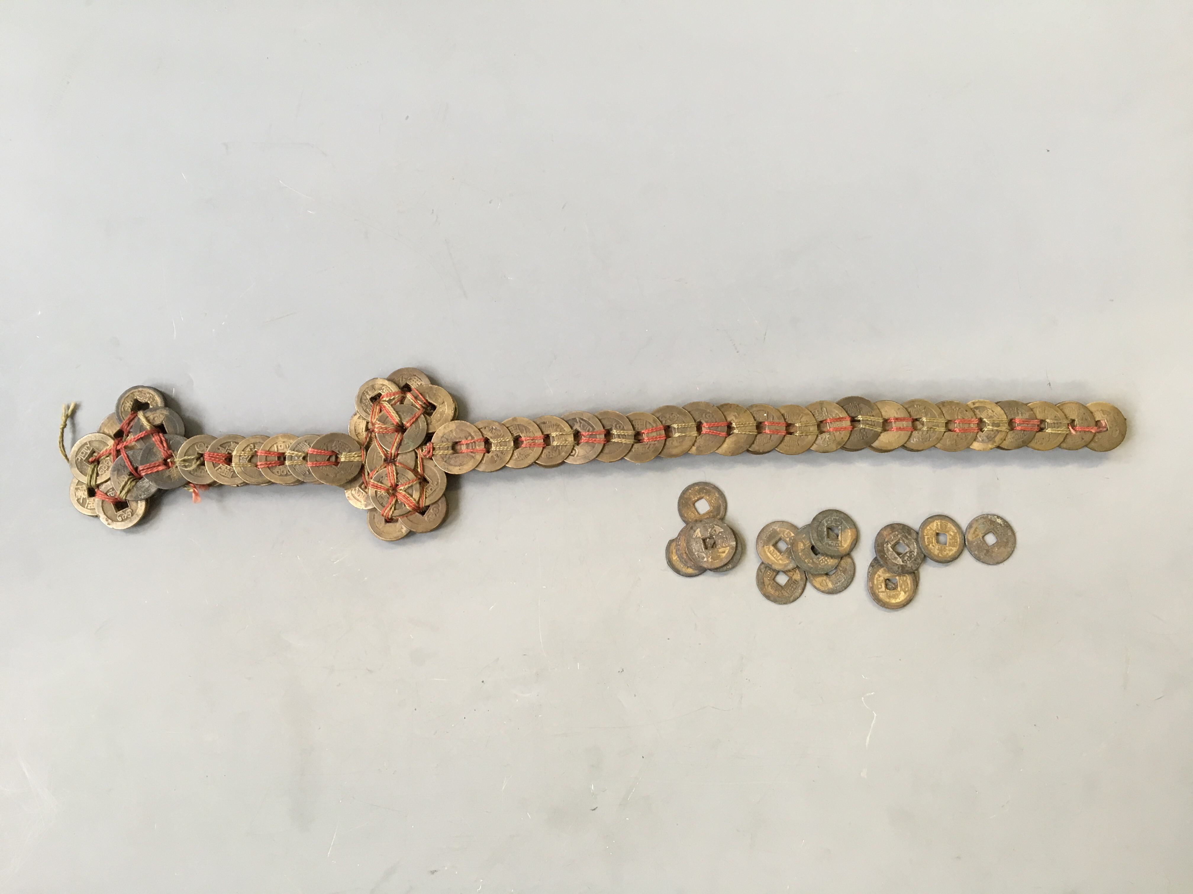 A Chinese talisman coin sword.