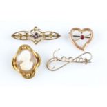 A collection of brooches, to include a purple paste and seed pearl brooch, stamped 9ct, a red