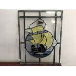 A stained glass window with gallon ship with yellow sale, 56.5cm by 44cm