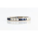 A diamond and sapphire full eternity ring, set alternately with three square cut sapphires and three